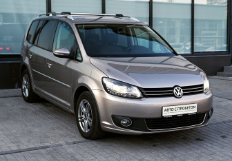 Подержанный автомобиль Volkswagen Touran 2012 года (7 фото)