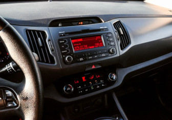 Подержанный автомобиль Kia Sportage 2012 года (10 фото)