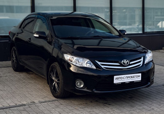Подержанный автомобиль Toyota Corolla Sedan 2012 года (7 фото)