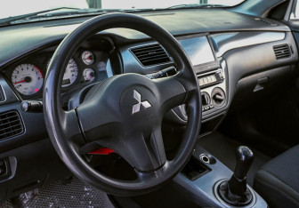 Подержанный автомобиль Mitsubishi Lancer Wagon 2007 года (10 фото)