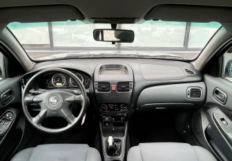 Подержанный автомобиль Nissan Almera Sedan 2005 года (10 фото)