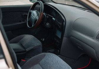 Подержанный автомобиль Kia Spectra Sedan 2007 года (11 фото)