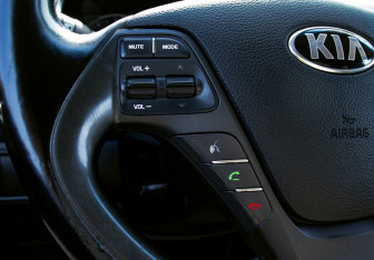 Подержанный автомобиль Kia Cerato Sedan 2013 года (14 фото)