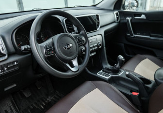 Подержанный автомобиль Kia Sportage 2018 года (9 фото)