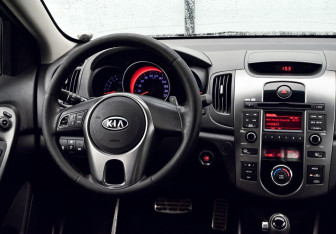 Подержанный автомобиль Kia Cerato Sedan 2011 года (18 фото)