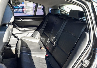 Подержанный автомобиль BMW X4 2015 года (16 фото)