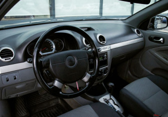 Подержанный автомобиль Chevrolet Lacetti Hatchback 2010 года (14 фото)