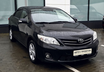 Подержанный автомобиль Toyota Corolla Sedan 2010 года (7 фото)