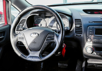 Подержанный автомобиль Kia Cerato Sedan 2014 года (11 фото)