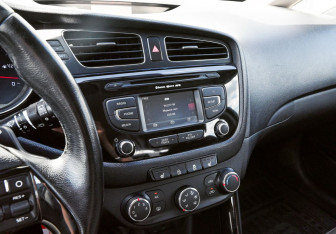 Подержанный автомобиль Kia Ceed Hatchback 2014 года (10 фото)