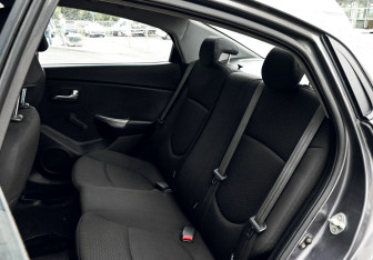 Подержанный автомобиль Kia Rio Sedan 2014 года (18 фото)