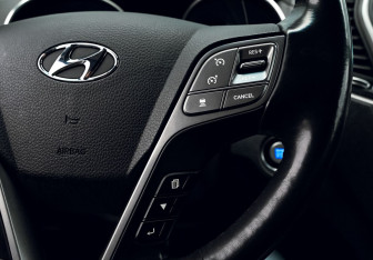 Подержанный автомобиль Hyundai Santa Fe 2016 года (13 фото)