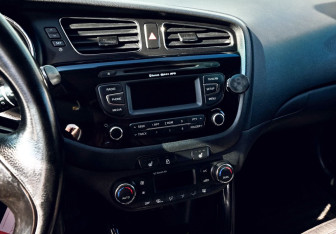 Подержанный автомобиль Kia Ceed Hatchback 2014 года (13 фото)