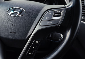 Подержанный автомобиль Hyundai Santa Fe 2015 года (6 фото)