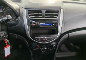 Подержанный автомобиль Hyundai Solaris Sedan 2011 года (14 фото)