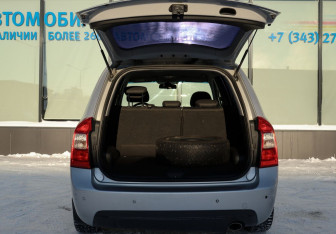 Подержанный автомобиль Kia Carens 2007 года (18 фото)