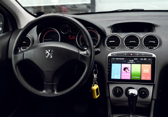 Подержанный автомобиль Peugeot 308 Wagon 2010 года (18 фото)