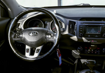 Подержанный автомобиль Kia Sportage 2014 года (19 фото)
