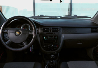 Подержанный автомобиль Chevrolet Lacetti Sedan 2010 года (12 фото)