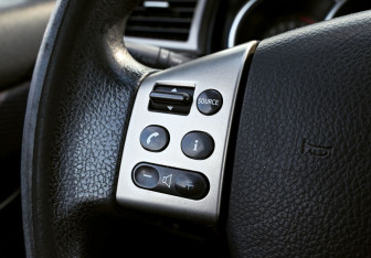 Подержанный автомобиль Nissan Tiida Hatchback 2008 года (13 фото)