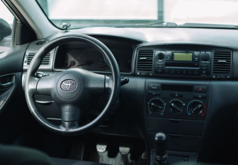 Подержанный автомобиль Toyota Corolla Sedan 2006 года (10 фото)