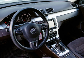 Подержанный автомобиль Volkswagen Passat Sedan 2011 года (15 фото)