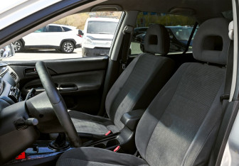 Подержанный автомобиль Mitsubishi Lancer Sedan 2005 года (14 фото)