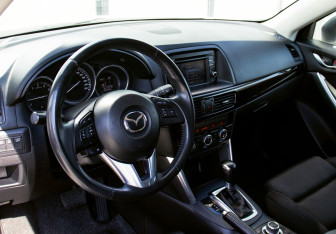 Подержанный автомобиль Mazda CX-5 2014 года (15 фото)