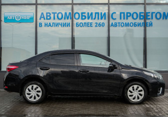 Подержанный автомобиль Toyota Corolla Sedan 2013 года (6 фото)