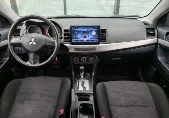 Подержанный автомобиль Mitsubishi Lancer Sedan 2008 года (10 фото)