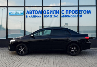 Подержанный автомобиль Toyota Corolla Sedan 2012 года (2 фото)
