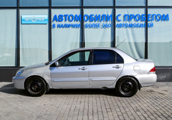 Подержанный автомобиль Mitsubishi Lancer Sedan 2004 года (2 фото)