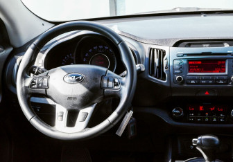 Подержанный автомобиль Kia Sportage 2013 года (20 фото)