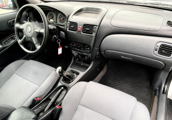 Подержанный автомобиль Nissan Almera Sedan 2005 года (11 фото)