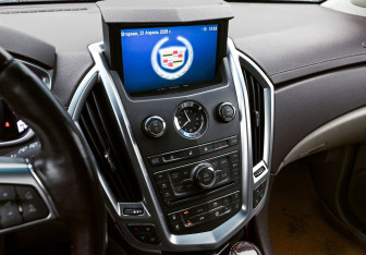 Подержанный автомобиль Cadillac SRX 2011 года (10 фото)