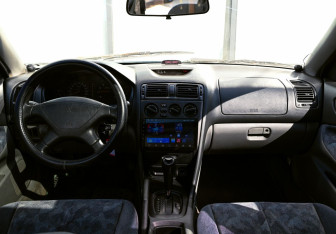 Подержанный автомобиль Mitsubishi Galant Wagon 1997 года (16 фото)