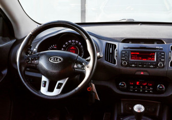 Подержанный автомобиль Kia Sportage 2012 года (19 фото)