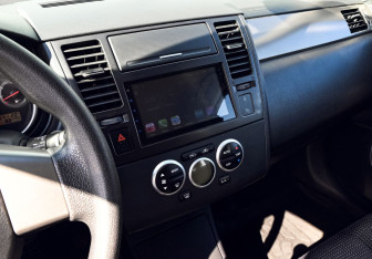 Подержанный автомобиль Nissan Tiida Hatchback 2012 года (13 фото)
