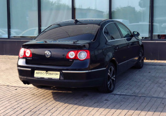 Подержанный автомобиль Volkswagen Passat Sedan 2010 года (5 фото)