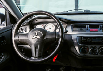 Подержанный автомобиль Mitsubishi Lancer Wagon 2006 года (10 фото)