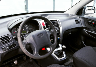 Подержанный автомобиль Hyundai Tucson 2008 года (13 фото)