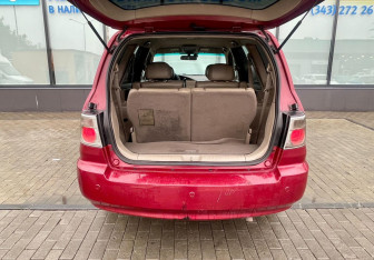 Подержанный автомобиль Kia X-Trek 2004 года (17 фото)