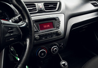 Подержанный автомобиль Kia Rio Sedan 2014 года (11 фото)