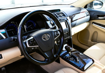 Подержанный автомобиль Toyota Camry Sedan 2015 года (15 фото)
