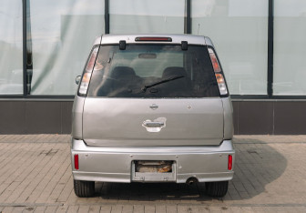 Подержанный автомобиль Nissan Cube 2001 года (4 фото)