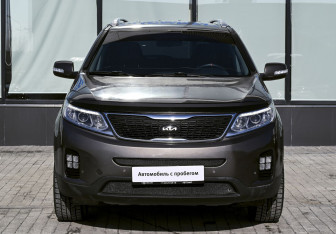 Подержанный автомобиль Kia Sorento 2013 года (8 фото)