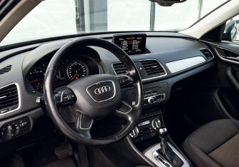 Подержанный автомобиль Audi Q3 2014 года (16 фото)