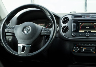 Подержанный автомобиль Volkswagen Tiguan 2013 года (21 фото)