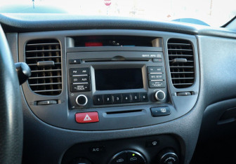 Подержанный автомобиль Kia Rio Sedan 2011 года (12 фото)