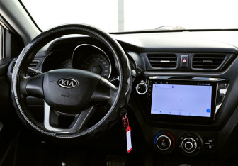 Подержанный автомобиль Kia Rio Sedan 2012 года (19 фото)